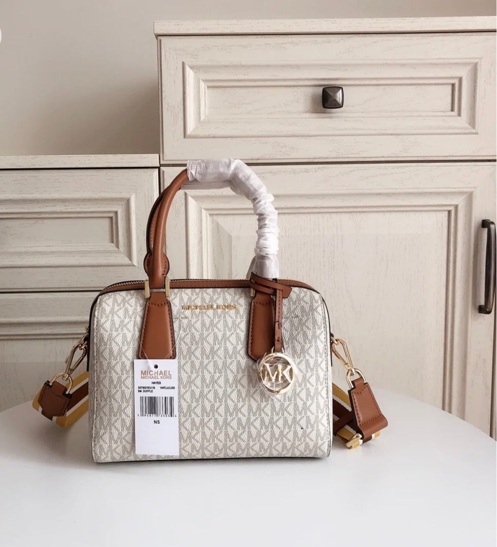 MICHAEL KORS HAYES SMALL DUFFLE BAG IN MK LOGO