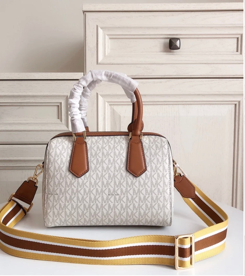 MICHAEL KORS HAYES SMALL DUFFLE BAG IN MK LOGO