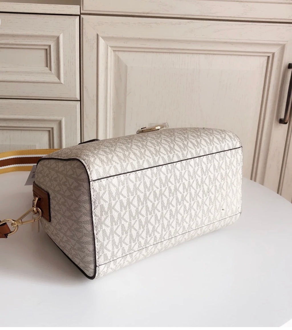 MICHAEL KORS HAYES SMALL DUFFLE BAG IN MK LOGO